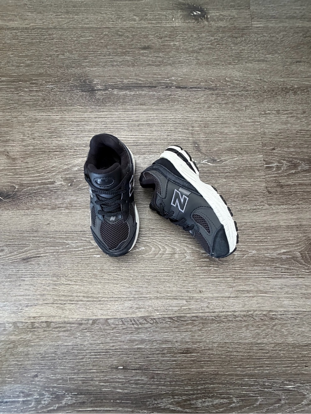 New Balance Kids Black and White Runner Sneakers